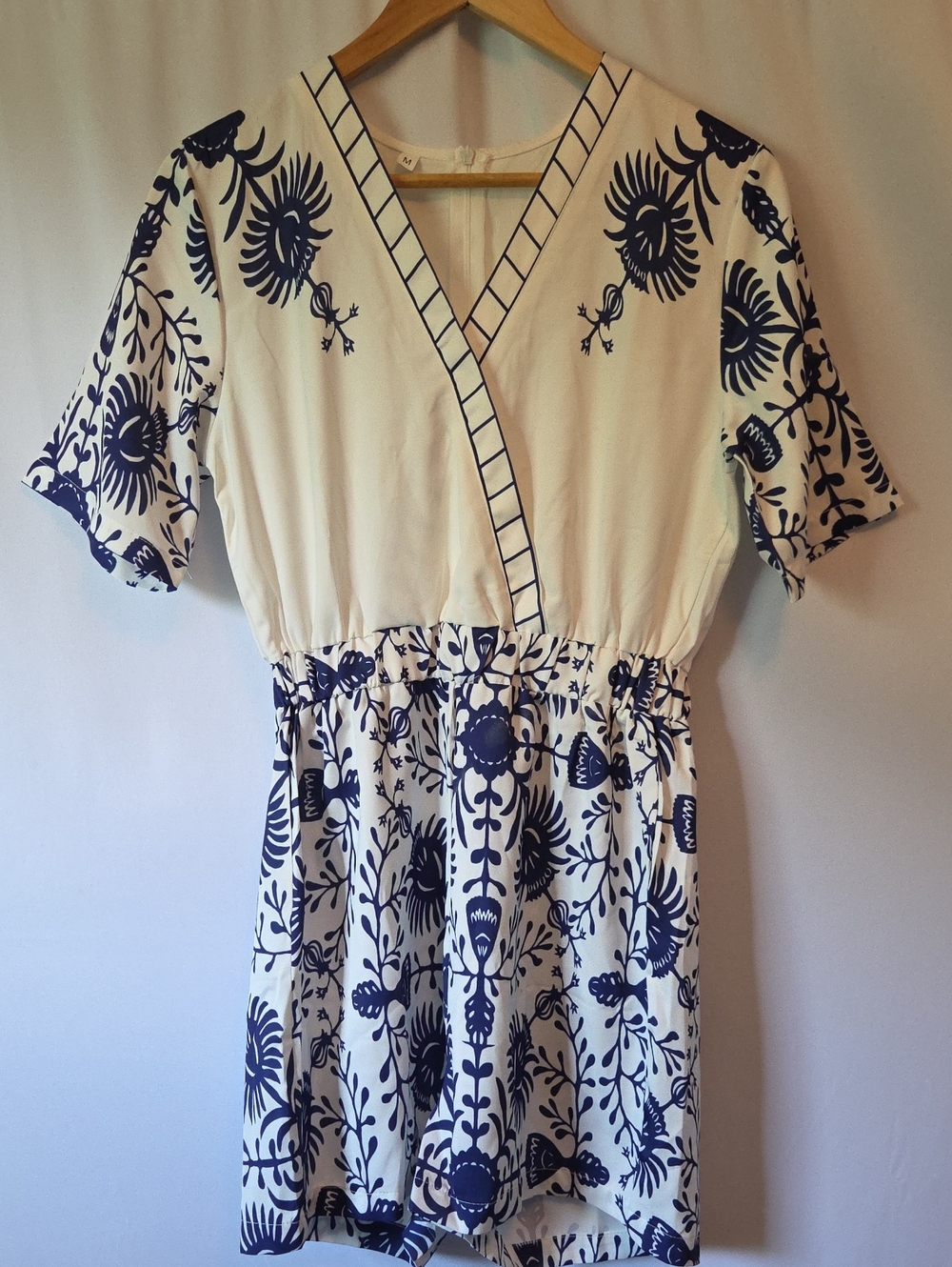 SHEIN White and Navy Floral Wrap-Style Romper